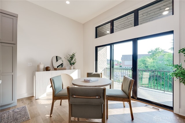 dining room featuring light hardwood / wood-style flooring