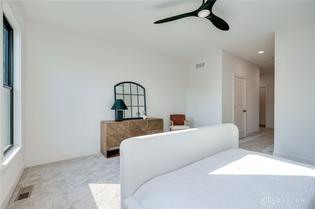 carpeted bedroom featuring ceiling fan