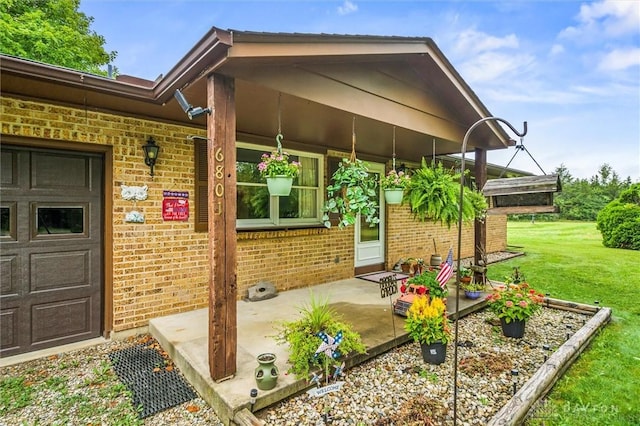 exterior space featuring brick siding and a lawn