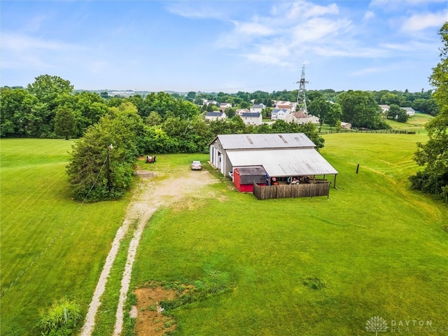 birds eye view of property featuring a rural view