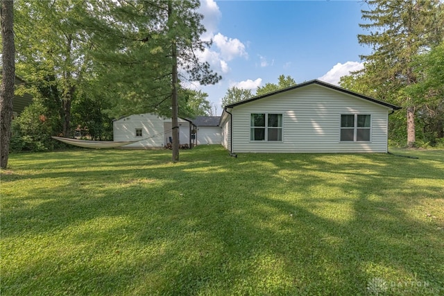 exterior space with a lawn