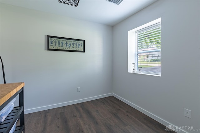 interior space with dark wood-type flooring