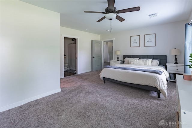 carpeted bedroom featuring ceiling fan and ensuite bath