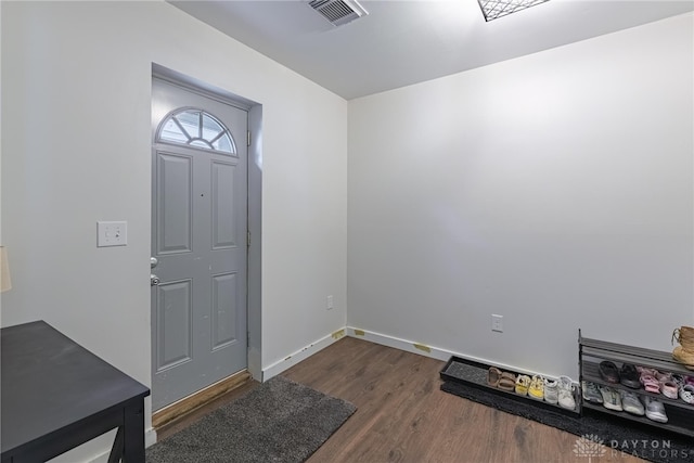 entrance foyer featuring dark hardwood / wood-style flooring