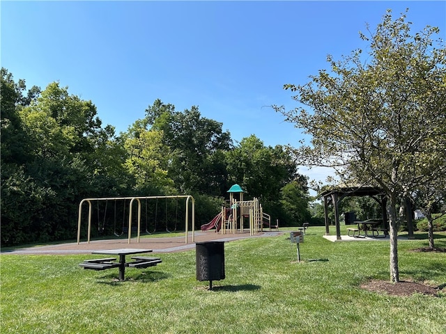 view of property's community with a playground, a lawn, and a gazebo