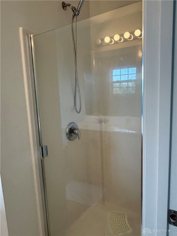 bathroom with an enclosed shower