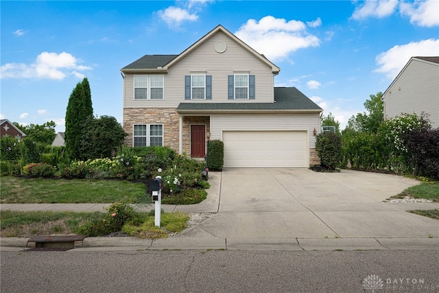 front of property featuring a garage