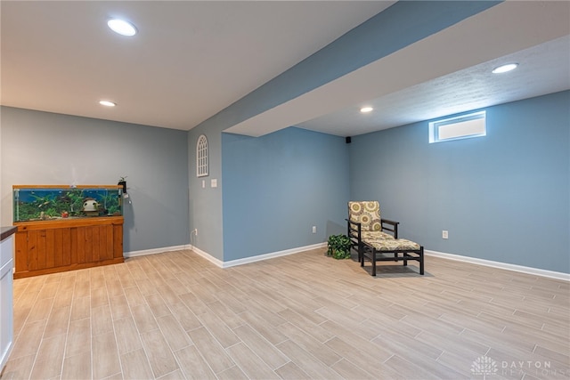 sitting room featuring light hardwood / wood-style floors