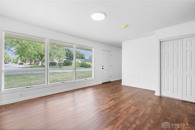 interior space with dark wood-type flooring