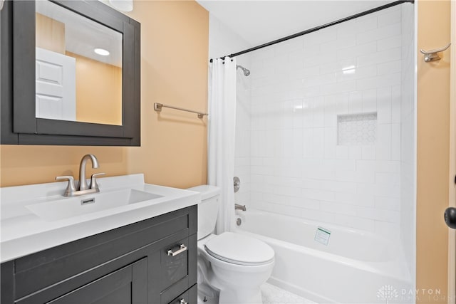 full bathroom with vanity, toilet, and shower / tub combo with curtain