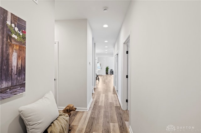 hallway featuring light hardwood / wood-style floors