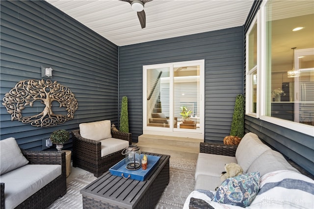 view of patio / terrace with ceiling fan and an outdoor living space