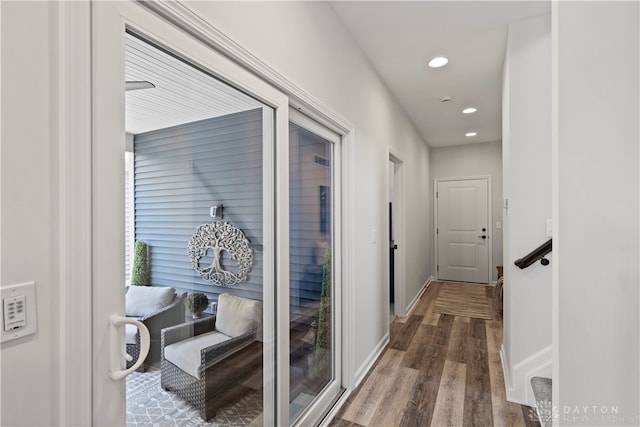 corridor featuring hardwood / wood-style flooring