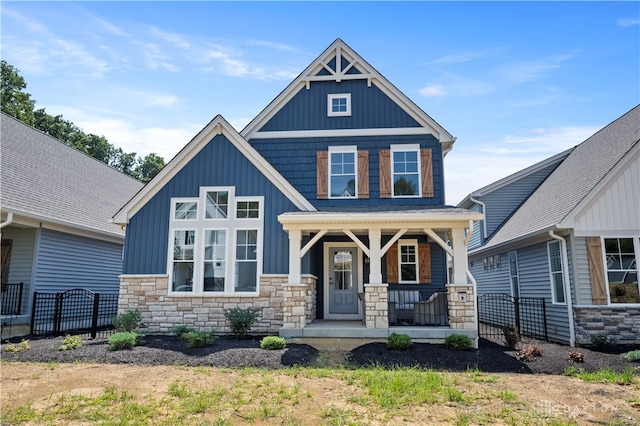 craftsman-style house featuring covered porch