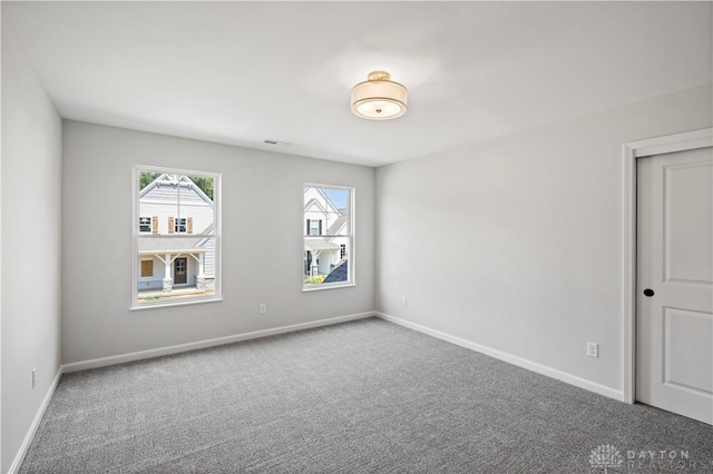 view of carpeted spare room