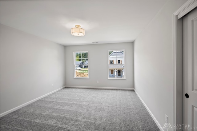 view of carpeted spare room