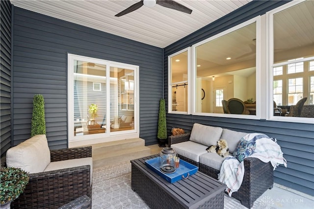 view of patio with an outdoor living space and ceiling fan