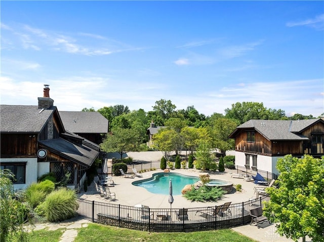 view of pool featuring a patio