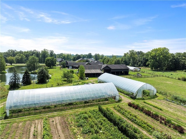 drone / aerial view with a rural view and a water view