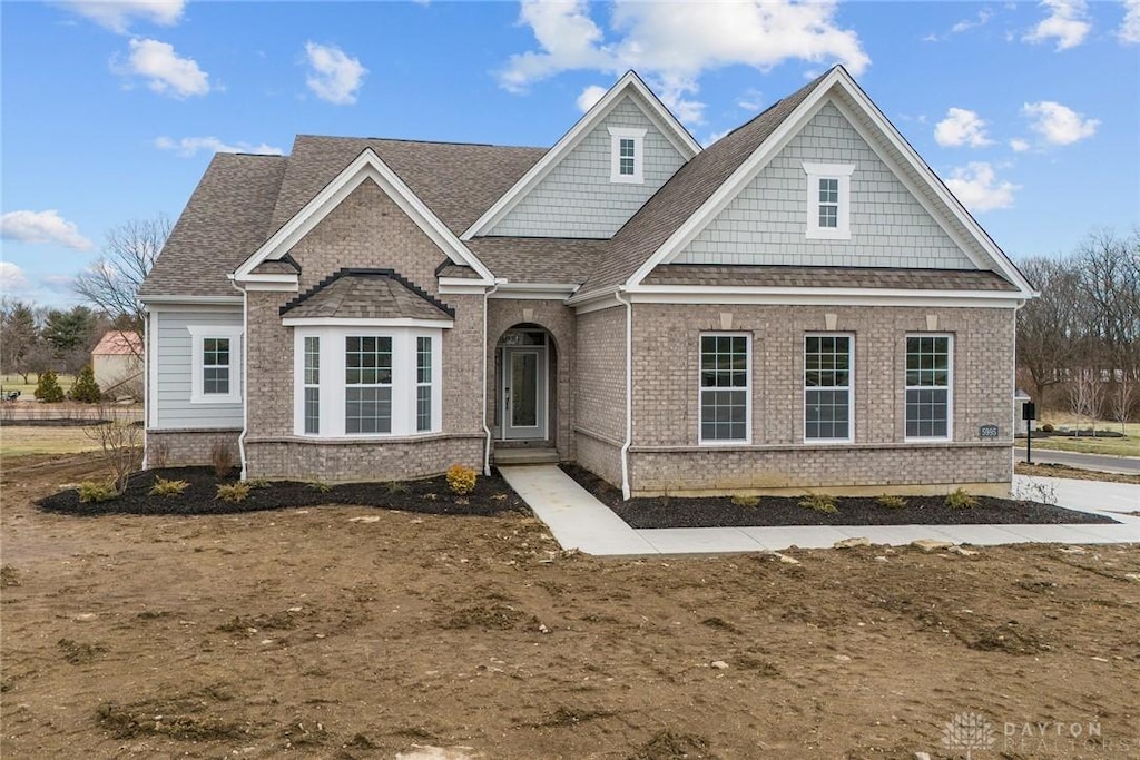 5995 Round Hill Ct Unit 65, Clearcreek Twp, OH 45066 - craftsman-style house featuring brick siding and roof with shingles