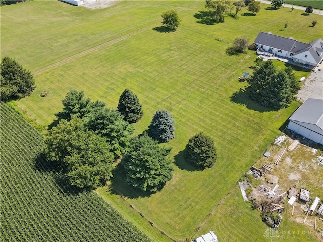 birds eye view of property with a rural view