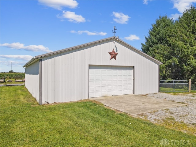 garage featuring a yard