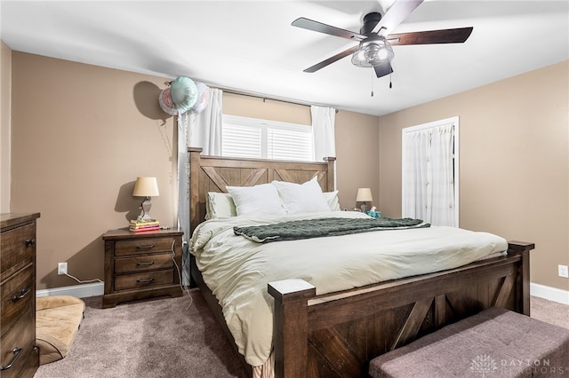 carpeted bedroom featuring ceiling fan