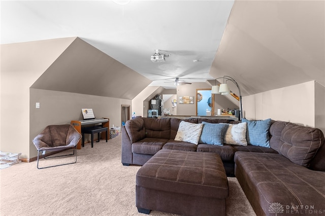 living room featuring lofted ceiling, carpet flooring, and ceiling fan