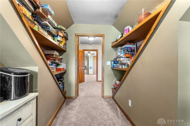 interior space featuring light colored carpet