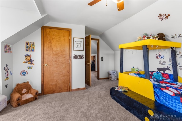 bedroom with lofted ceiling, carpet flooring, and ceiling fan