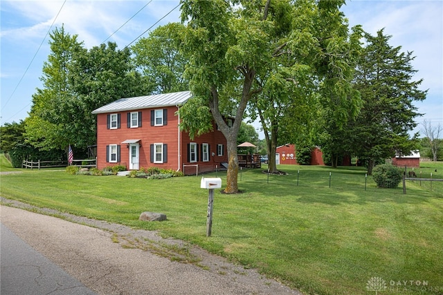 view of front of house with a front lawn