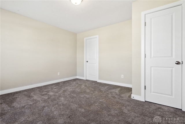 spare room with carpet