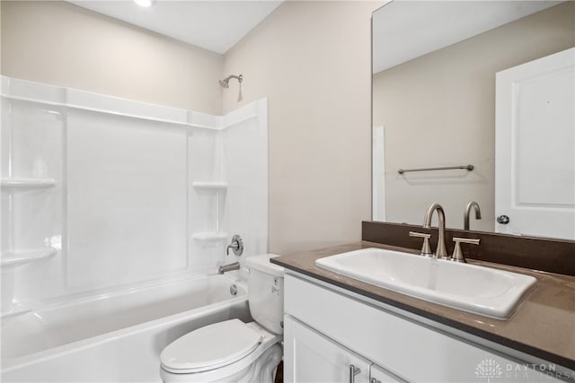 full bathroom featuring toilet, bathing tub / shower combination, and vanity