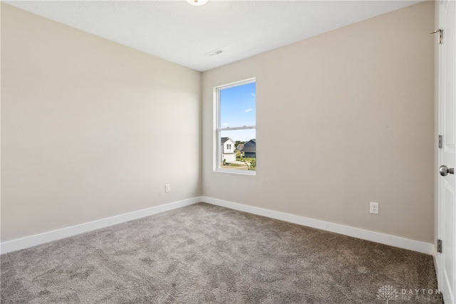 view of carpeted spare room