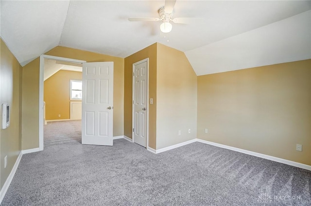 bonus room with carpet, ceiling fan, and lofted ceiling