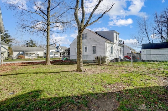 view of property exterior with a yard