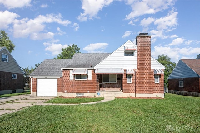 view of front of property featuring covered porch, a garage, and a front yard