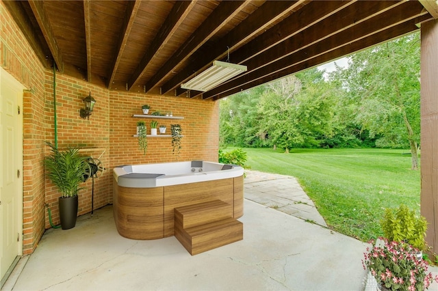 view of patio / terrace featuring a hot tub