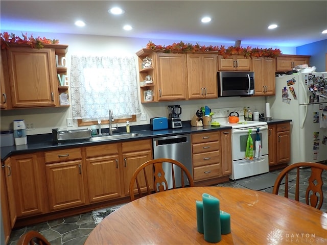 kitchen featuring stainless steel appliances and sink