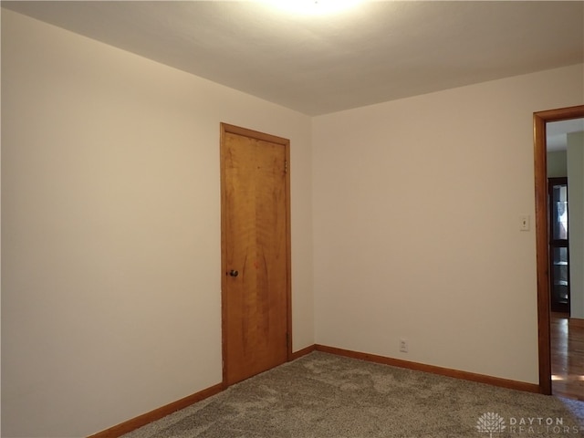 empty room with carpet floors