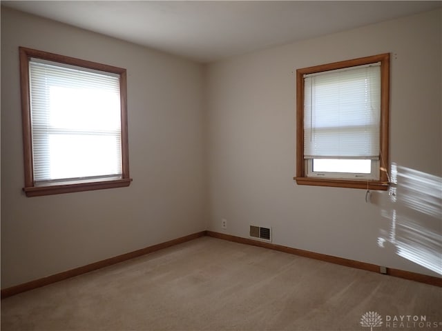 view of carpeted spare room