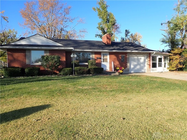 ranch-style house with a garage and a front lawn