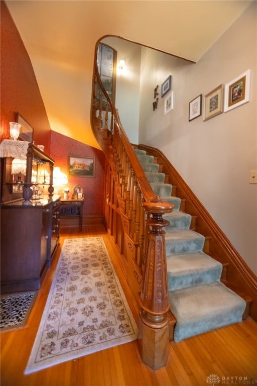 stairs with wood-type flooring