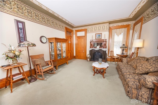 carpeted living room featuring ornamental molding