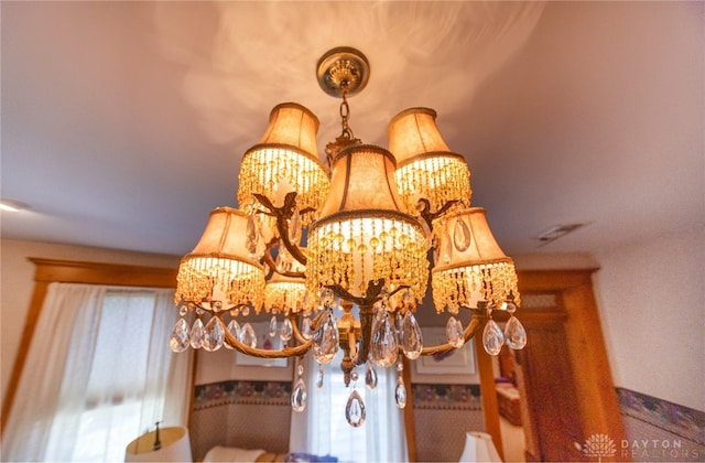 interior details with a chandelier