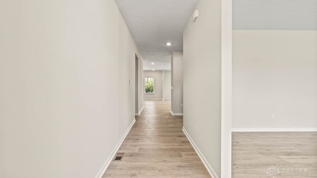 hallway featuring light hardwood / wood-style floors