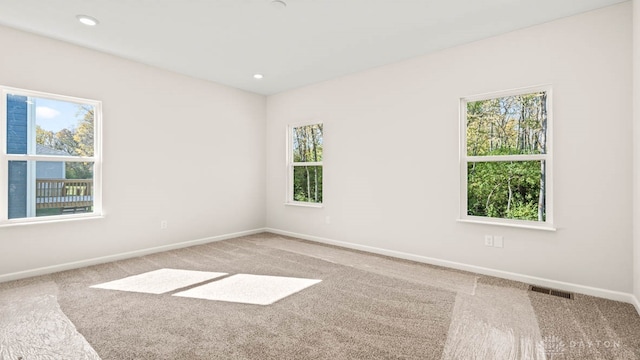 view of carpeted spare room