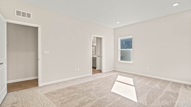 unfurnished bedroom with carpet floors