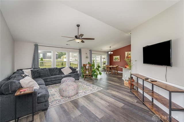 living room featuring ceiling fan, dark hardwood / wood-style floors, and lofted ceiling