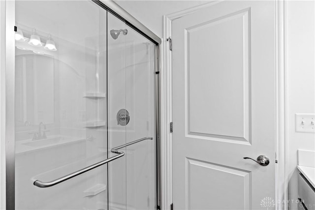 bathroom featuring an enclosed shower